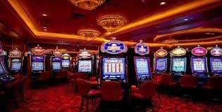 Layar permainan slot Play'n GO dengan simbol dan riwayat putaran